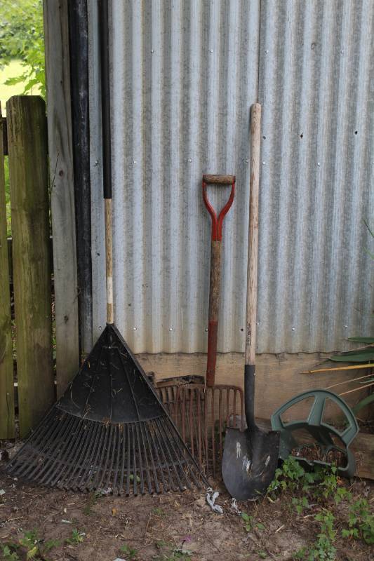 lot 1620 image: Large Rake, Pitchfork, Shovel, Garden Hose Holder