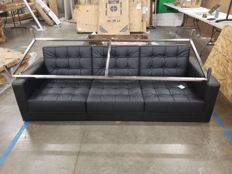 lot 5497 image: Black Leather Couch
