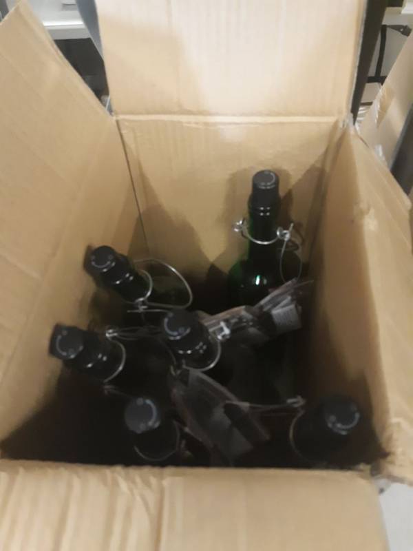 lot 5555 image: Gerson 9438649 13.75 x 3 in. 1 Lighted Wine Bottle Christmas Decoration Red & White & Green Glass - Pack of 6