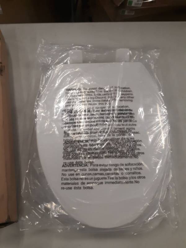 lot 5556 image: Elongated Toliet Seat