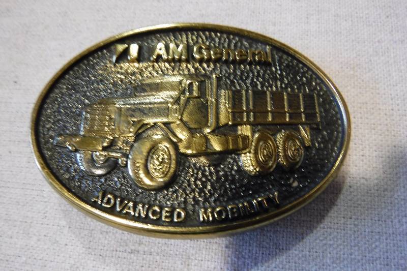 lot 3135 image: AM General belt buckle with truck on it