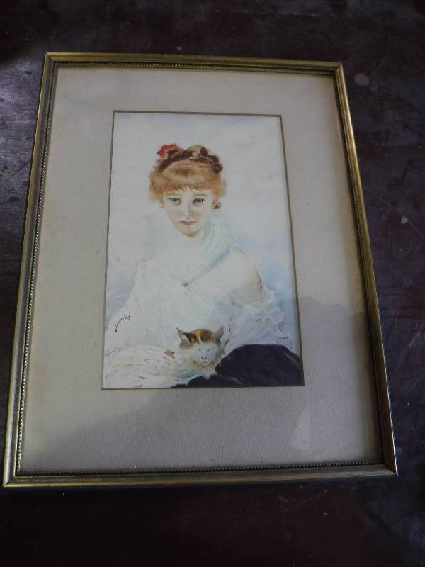 lot 2187 image: Woman with a cat framed art work