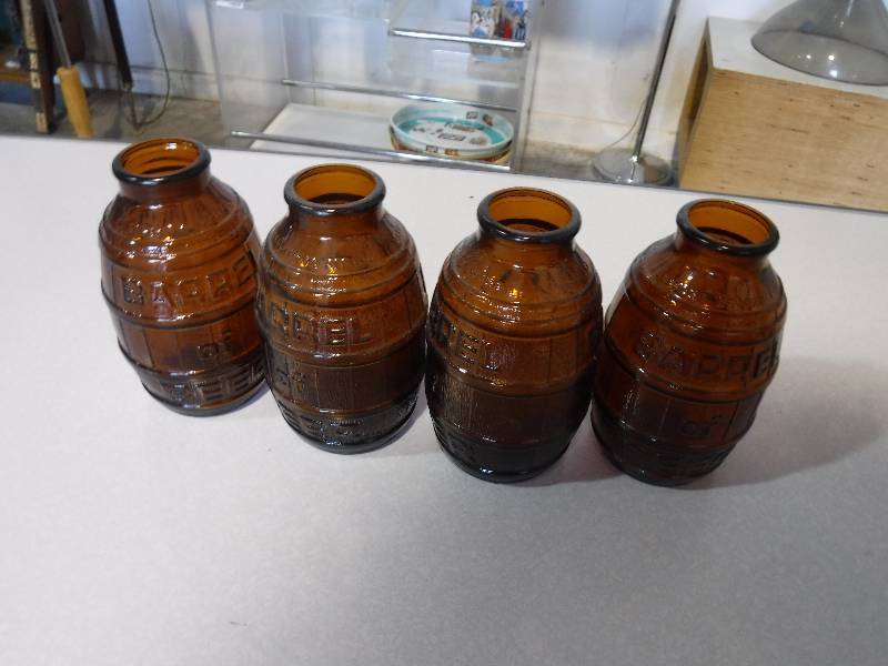 lot 3179 image: Brown barrel bottles