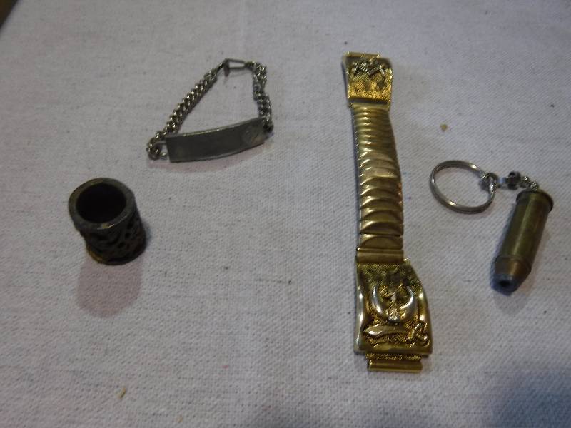 lot 3183 image: Masonic Lodge bracelet watch band, bullet on a key chain and more