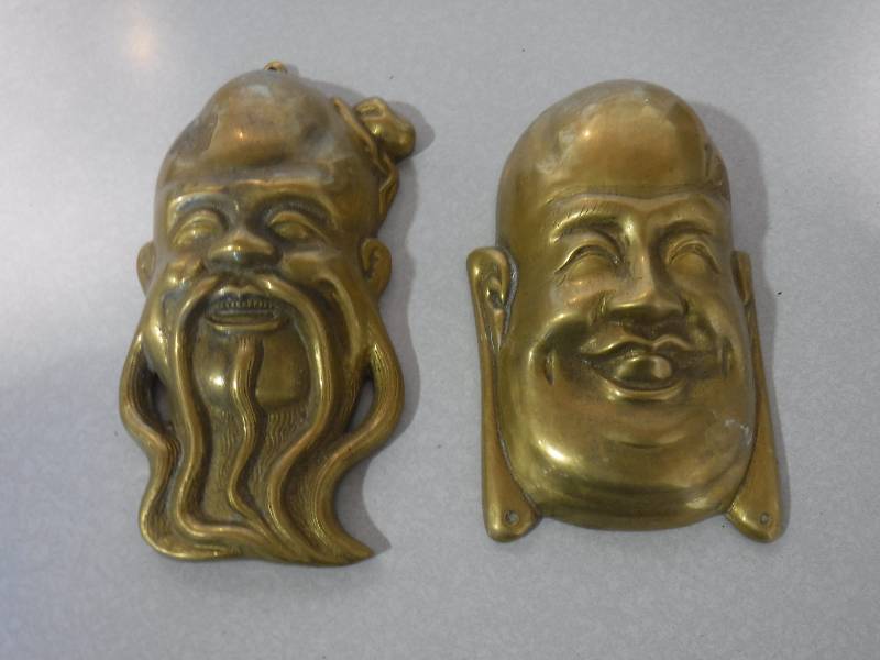 lot 3086 image: Buddha and Fu man Chu wall decor