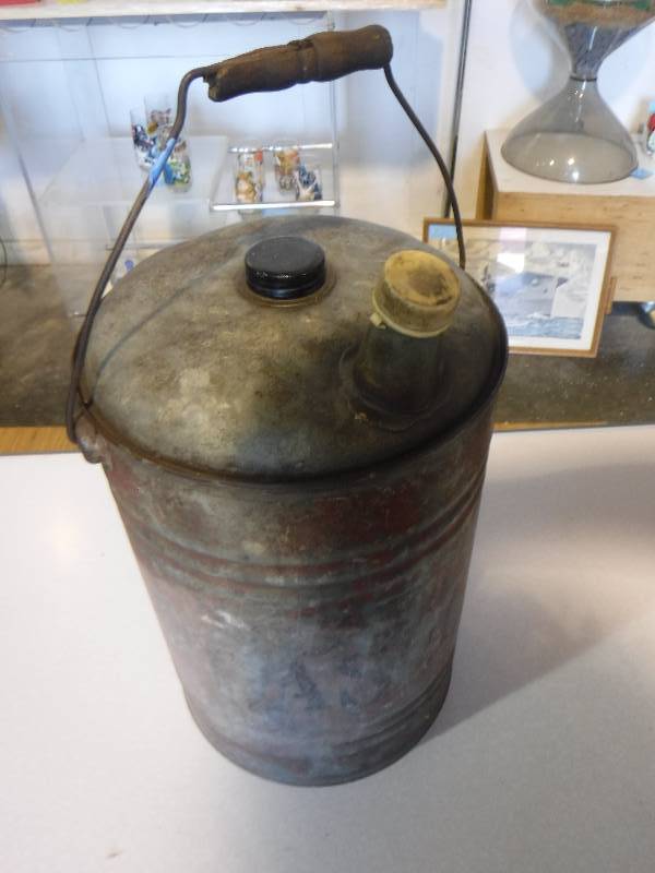 lot 3094 image: Vintage metal fuel can with spout