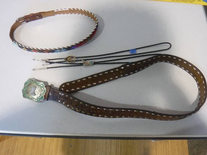 lot 3096 image: Leather belt with buckle and Bolo ties