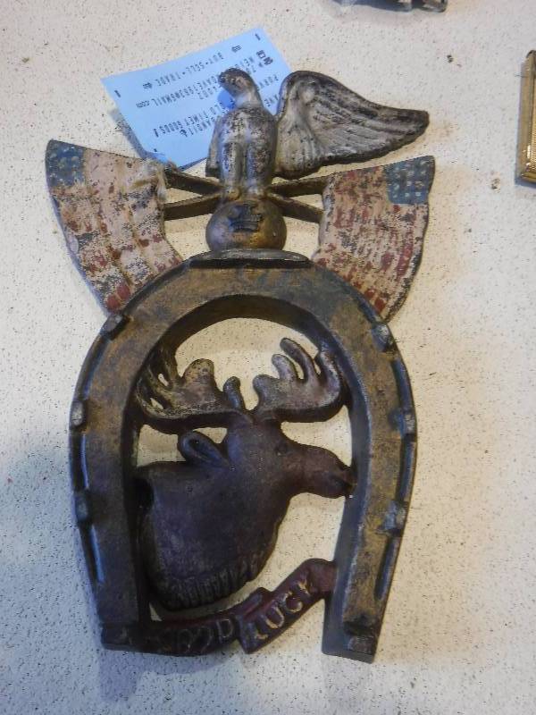 lot 3105 image: Vintage iron wall decor featuring an Eagle, moose, flags, horseshoe and words good luck