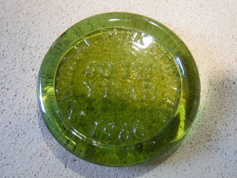 lot 3110 image: Green glass marked National Parks Service 50th year