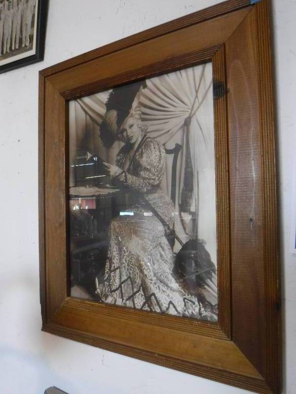 lot 3144 image: Framed Mae West photo