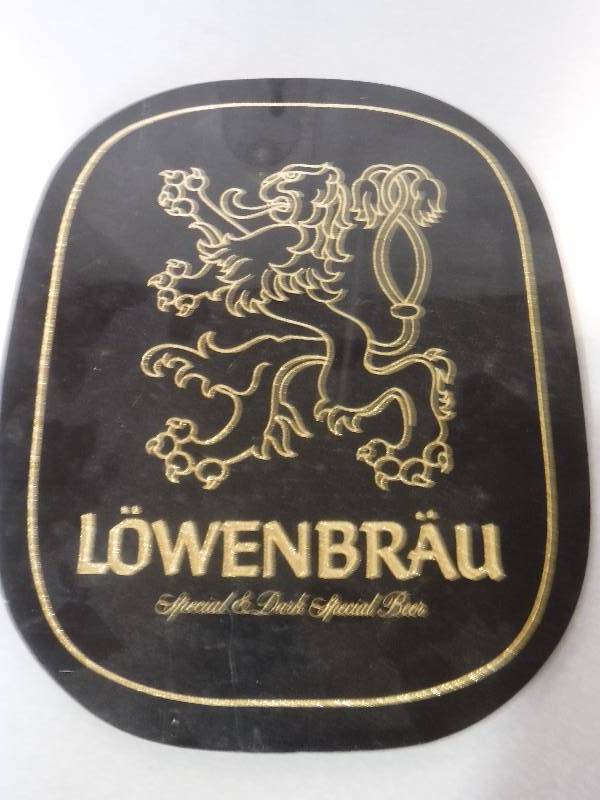 lot 3148 image: Lowenbrau Beer sing on easel