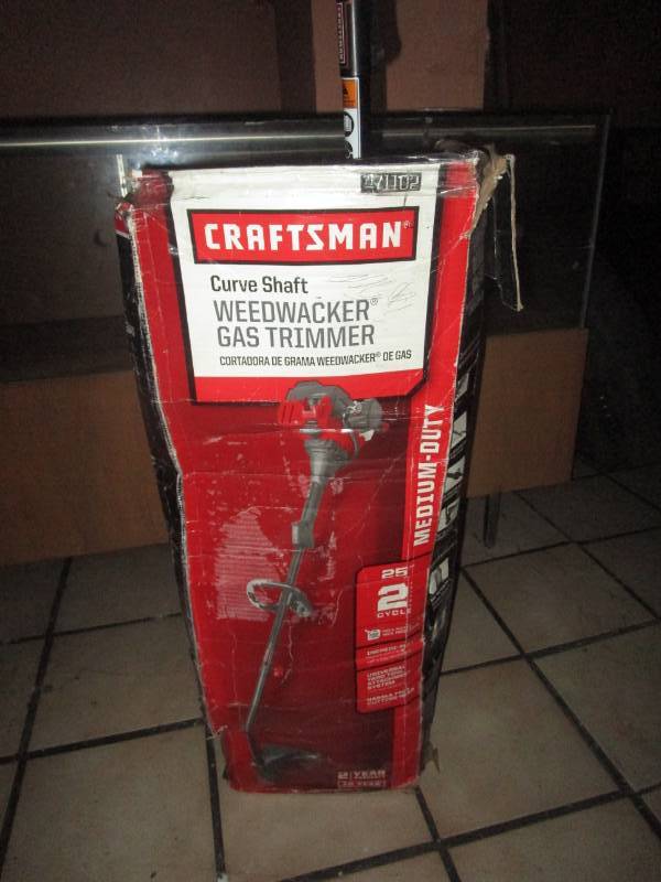 lot 5591 image: Craftsman Curve Shaft Weedwacker Gas Trimmer
