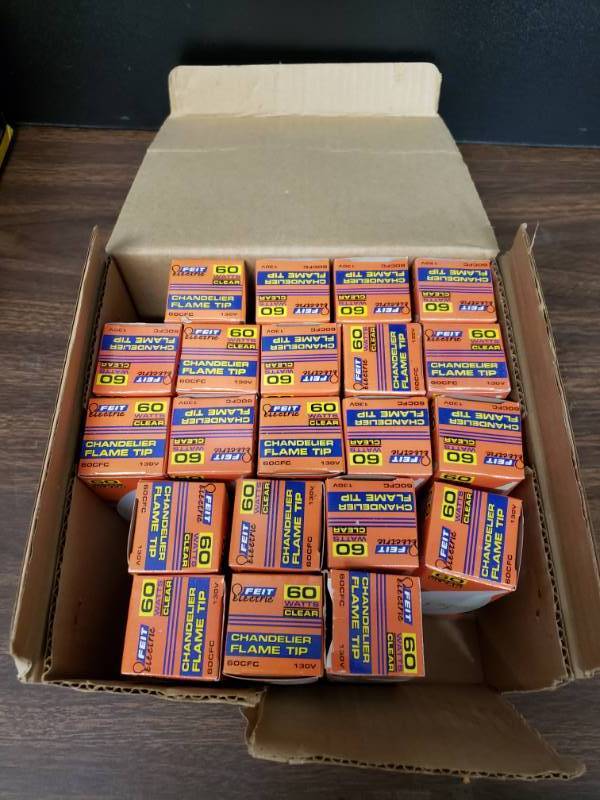 lot 1053 image: Lot of (21) Chandelier 60 Watt Clear Light-bulbs