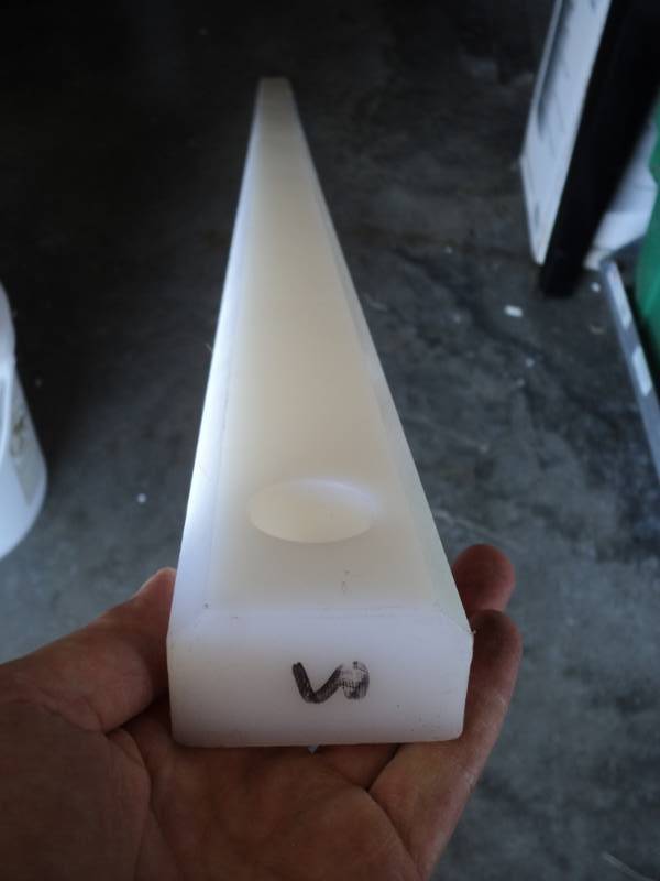 lot 9373 image: (1) piece plastic, white, approx 1-14 x 2 x 66