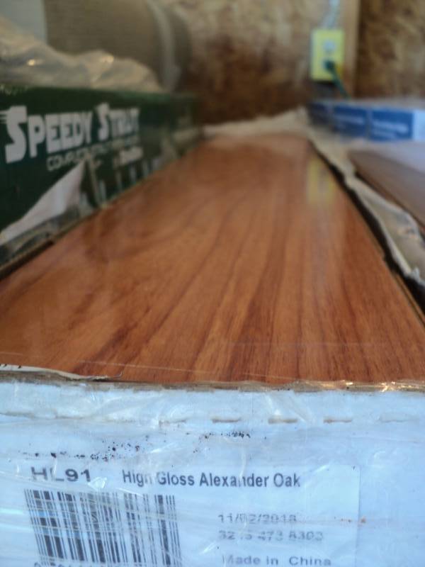 lot 9374 image: (1) box laminate flooring, 9 planks, 13.2 sq. ft. High Gloss Alexander oak, HL91