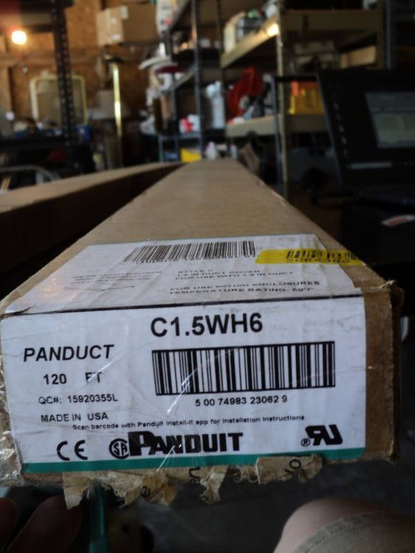 lot 9388 image: (1) box Panduit 1.5 duct cover, C15WH6, open box  approx 114 ft per box
