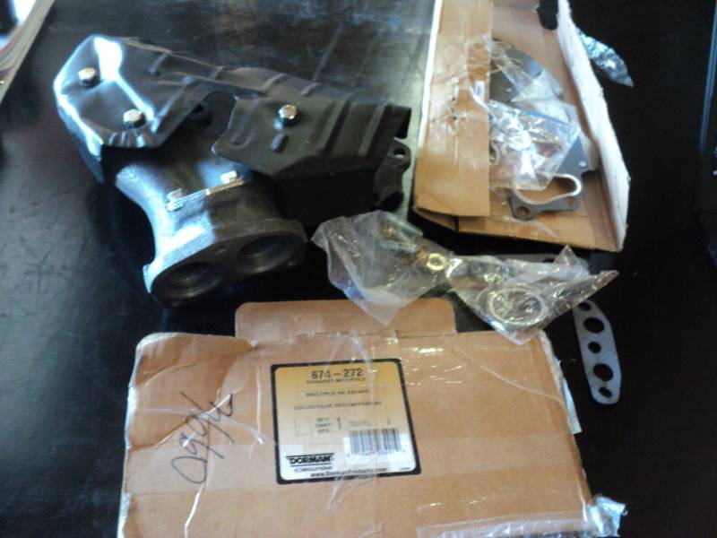 lot 9424 image: Dorman Exhaust Manifold 674-272, open box, may be incomplete