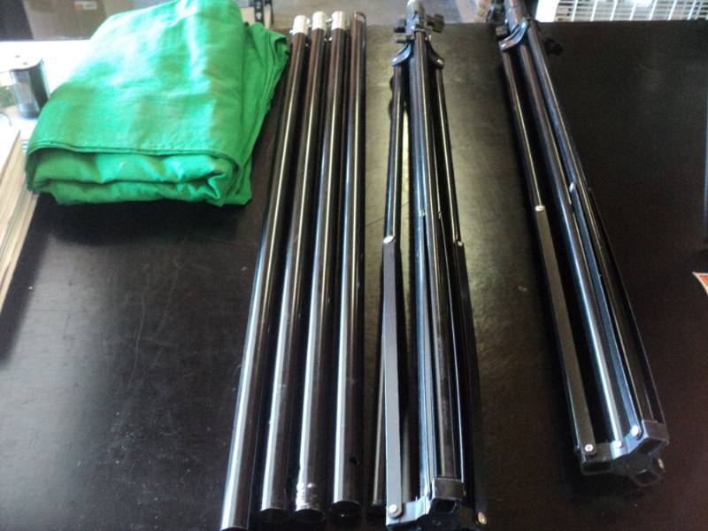 lot 9428 image: back drop frame with green cloth