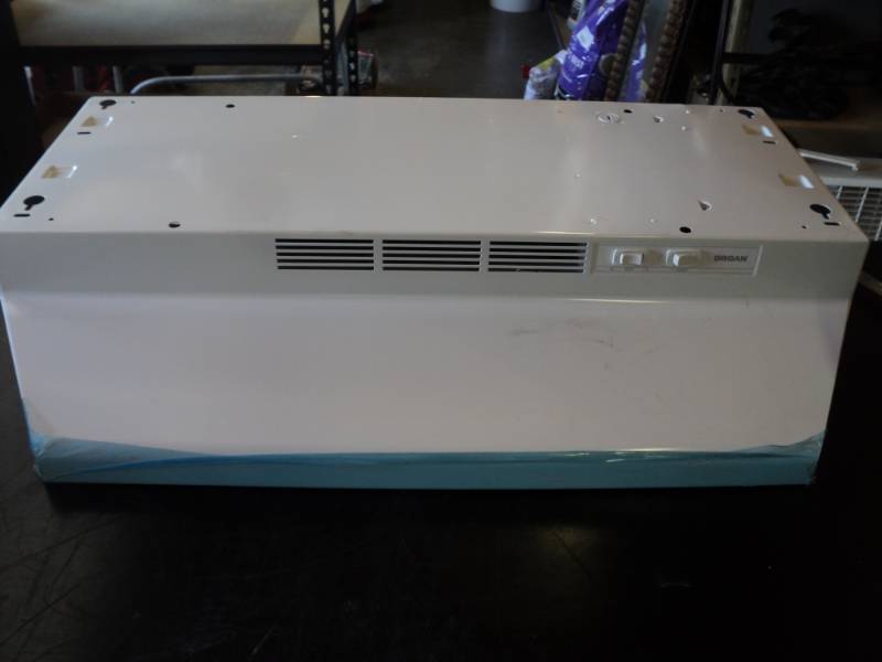 lot 9441 image: Broan Economy Range Hood, 30 White, Box is damaged, Hood appears unaffected.
