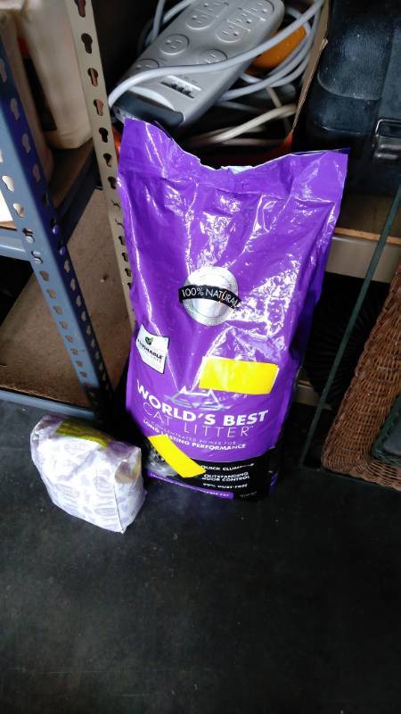 lot 9521 image: (2) bags Kitty Litter, (1) Worlds Best 28 lbs Lavender scent, (1) 9 lb bag Scoop Away