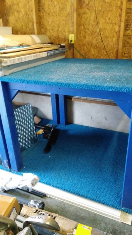 lot 9556 image: Large wooden display shelves, Blue with all weather carpet, 4 x 4 x 43 tall