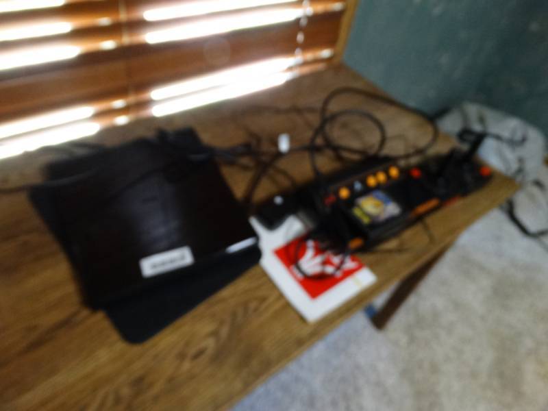 lot 413 image: Atari 40th anniversary console with two controllers and pacman game. and RCA and 1byone electronics.