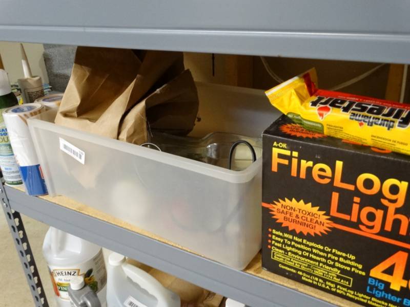lot 529 image: Kleenex firelog starters batteries misc.