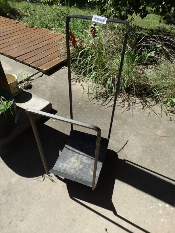 lot 743 image: Firewood rack on wheels