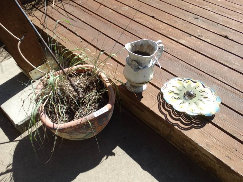 lot 748 image: Flower pots hanging wind spinner