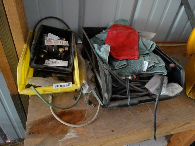 lot 936 image: Lot of various water hose equipment, stakes.
