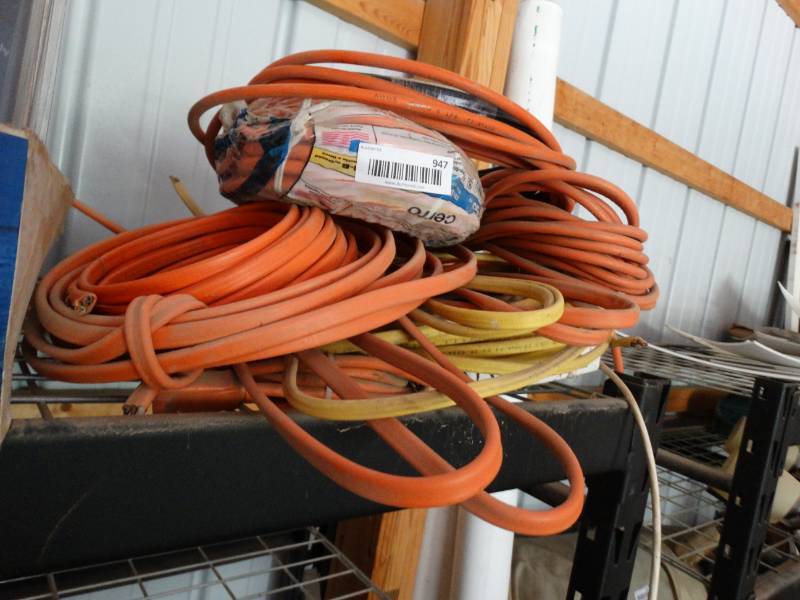 lot 947 image: Large lot of various extension cords.
