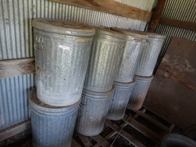 lot 2038 image: 8 metal trash cans w ceramic making supplies