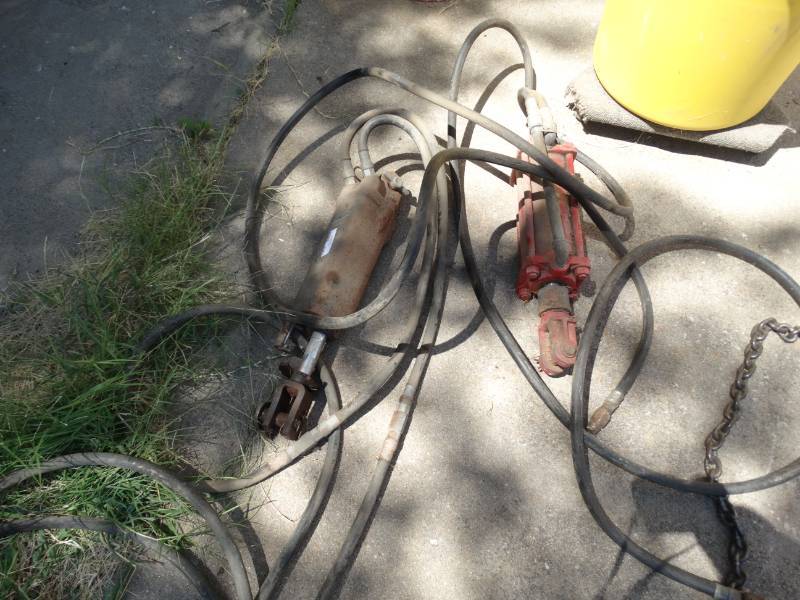 lot 2043 image: 2 hydraulic arms w hoses- 1 is John Deere