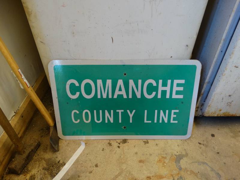 lot 2637 image: Comanche county line metal sign