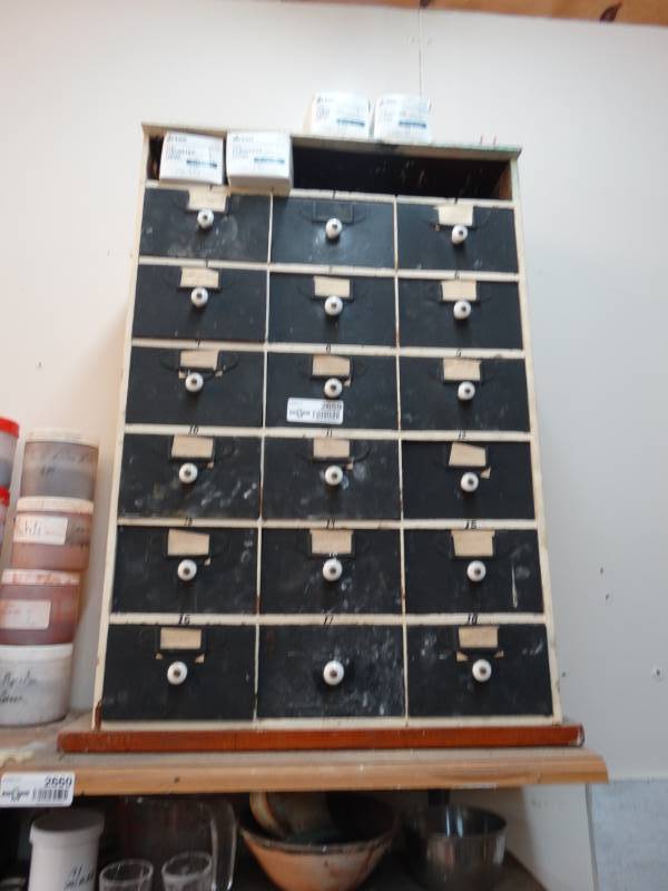lot 2659 image: Storage drawers w pottery dyes