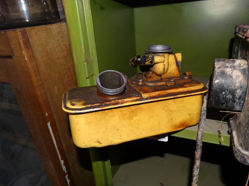 lot 2666 image: Small gas tank & electric fence charger