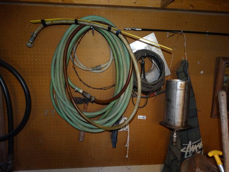 lot 2671 image: Contents of peg board- hoses work light misc tools