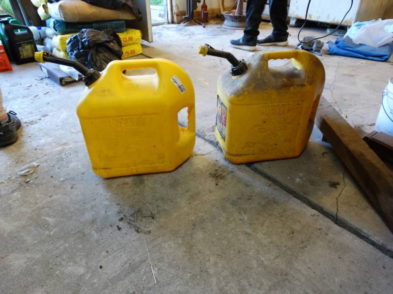lot 2725 image: 2- 5 gallon diesel cans