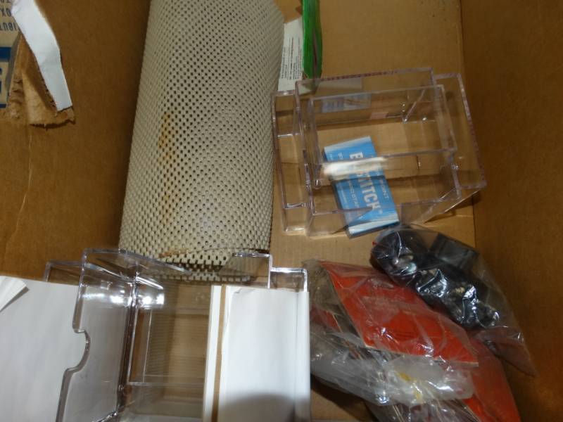 lot 434 image: Lot of wheels for plastic container, plastic containers, staples and more.