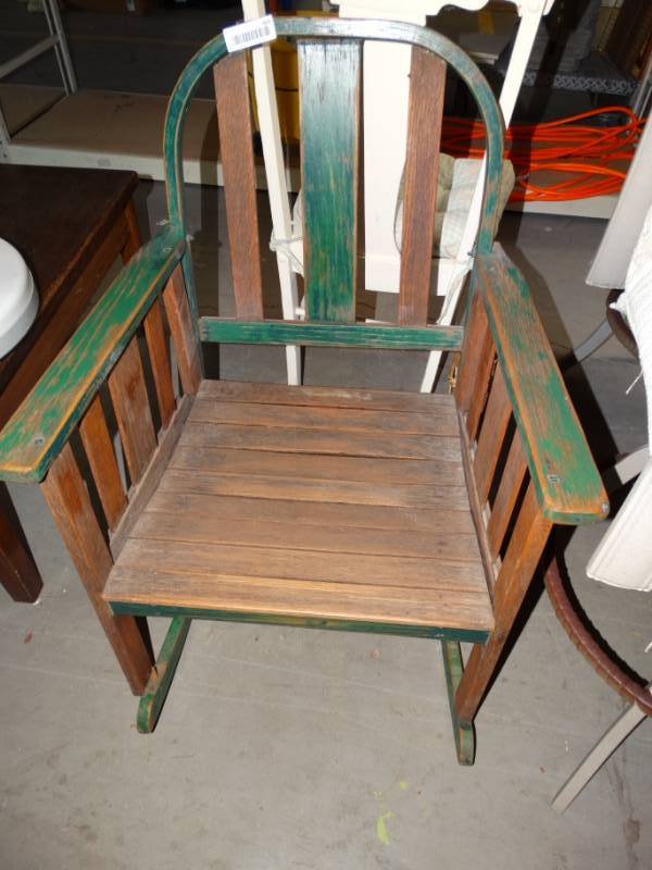 lot 469 image: Wooden rocking chair.