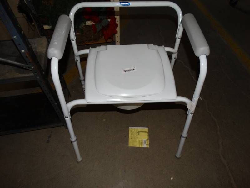 lot 517 image: Invacare bed cammode.