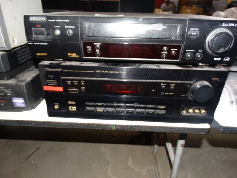 lot 541 image: Phillips VHS player and a Pioneer audiovideo multi- channel reciever.