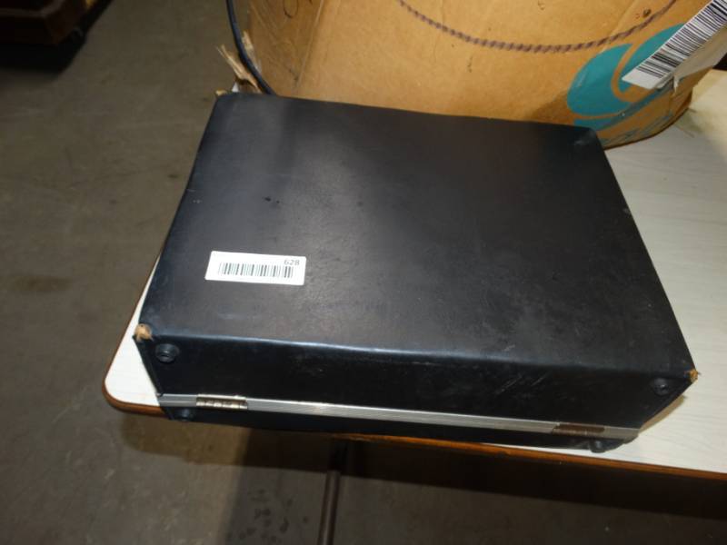 lot 628 image: Camera case and boses of jars.