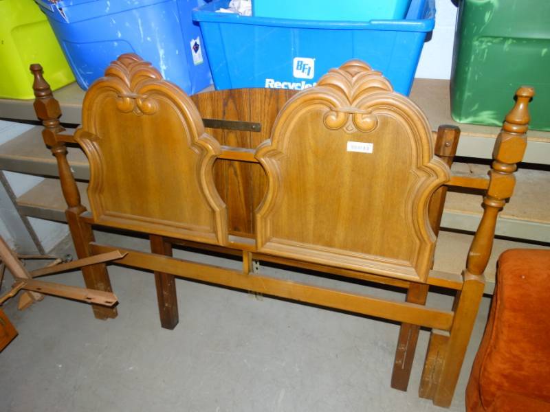 lot 690 image: Wooden bed frame, looks like full size.