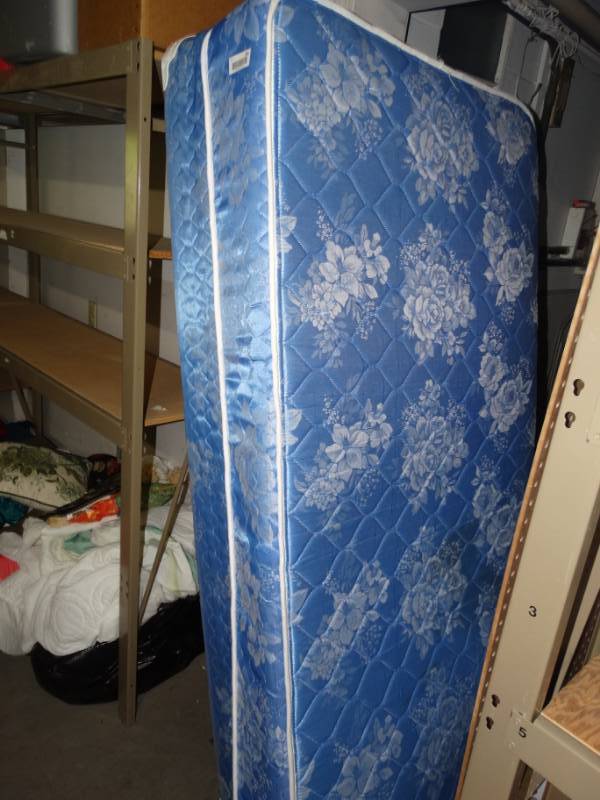 lot 695 image: Twin size mattress and box spring.