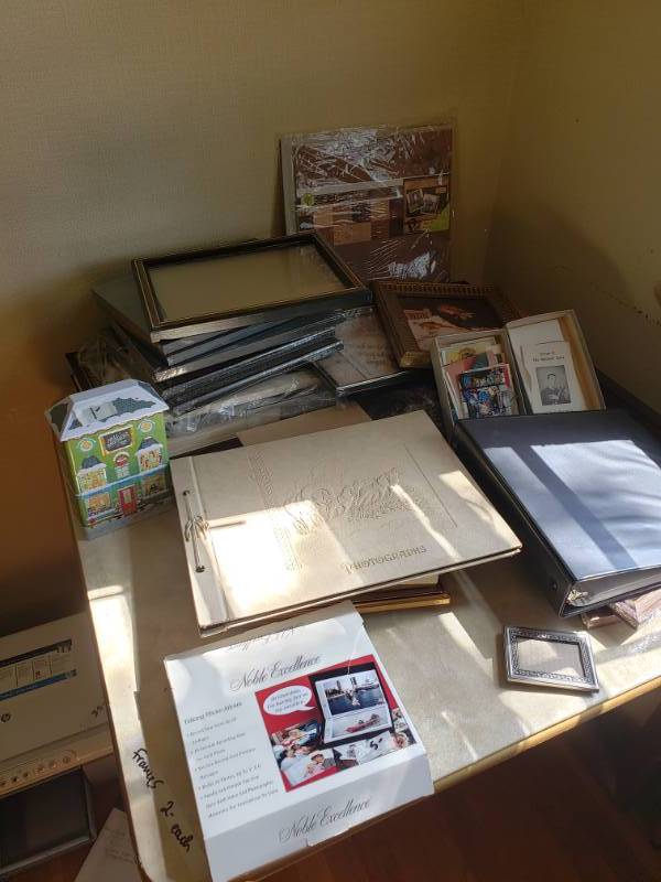 lot 1813 image: Table Top of Unused Photo Albums, Scrapbooking Pages, and Frames