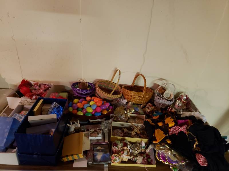 lot 1967 image: Table Full of Holiday Decorations- Bring your own boxes
