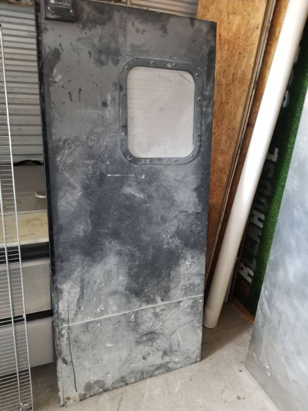 lot 2514 image: Chase 34in Swinging Kitchen Door