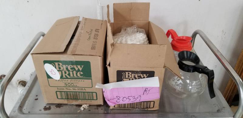 lot 2679 image: Case Lots of Coffee Filters and Two Glass Coffee Carafes