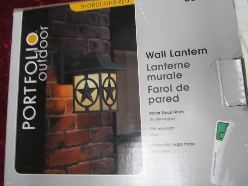 lot 1892 image: Portfolio Outdoor Wall Lantern Texas Star Motif